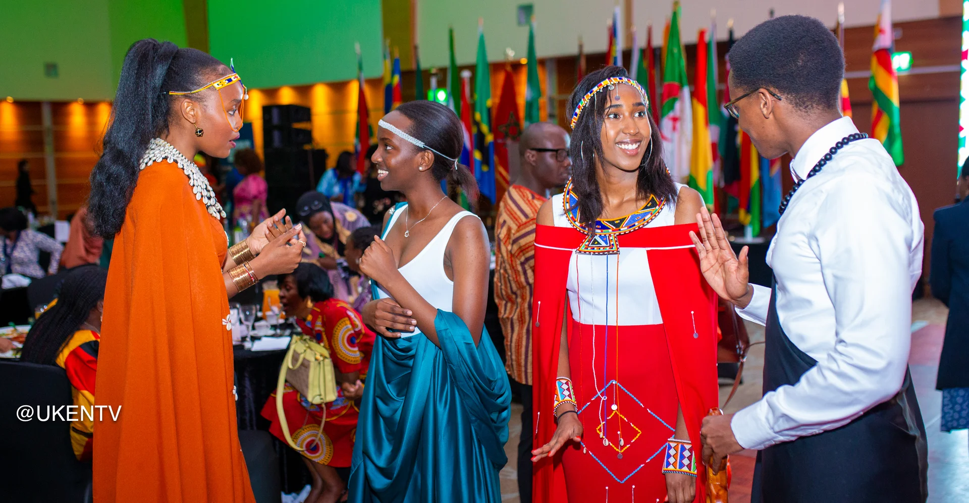 Community engagement and cultural exchange at TEEM Foundation event with participants in traditional dress