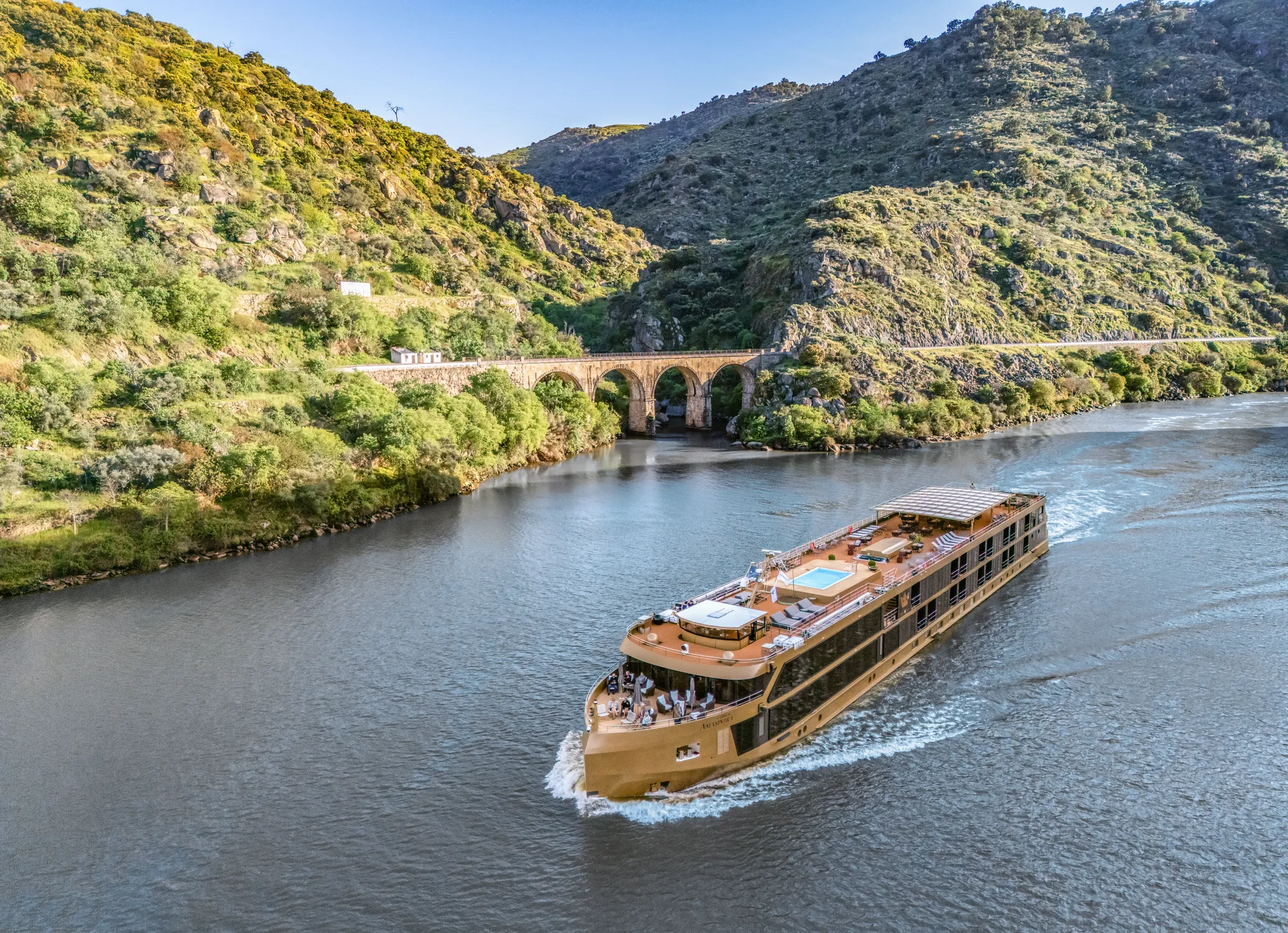 Luxury river cruises guide: AmaWaterways ship sailing through Portugal's Douro Valley