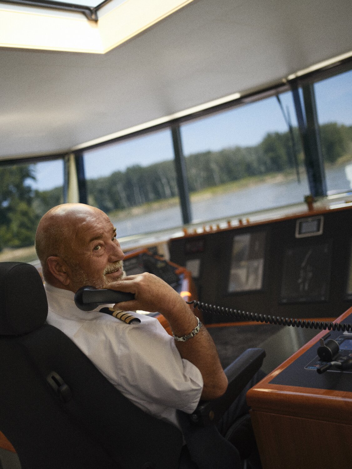 Captain on phone in