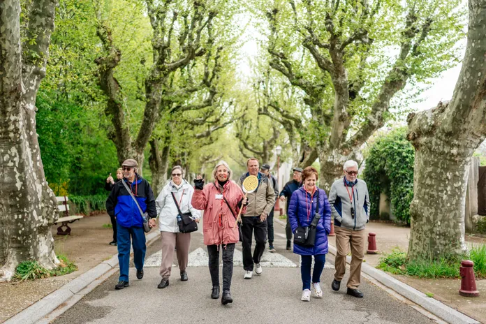 A group of people on a walking tour in France