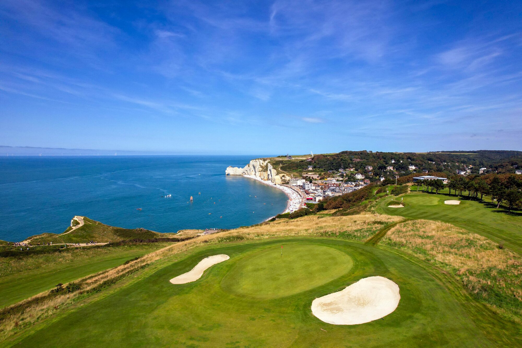 Aerial view of golf course by the coastline
