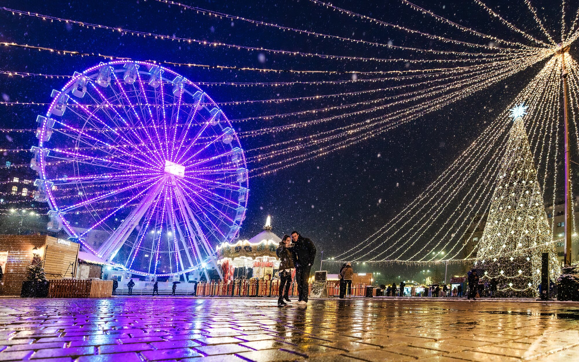 View of nighttime Christmas market in Brasov