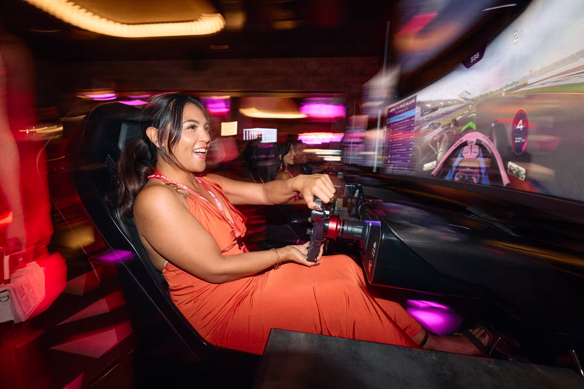 Guest enjoying Sim Racing at F1 Arcade