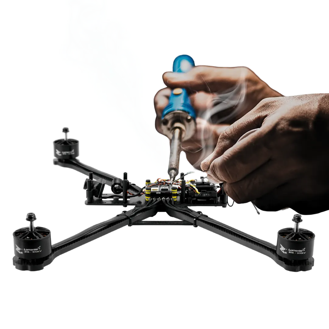 Hands holding a tool and fixing a drone