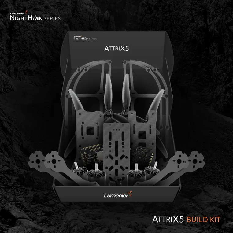 Lumenier NightHawk AttriX Build Kit in a box with a night desert landscape.