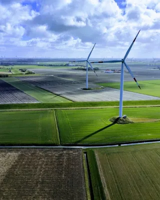 Farm land with wind turbines