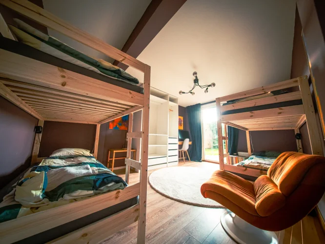 FlyTribe Villa spacious bedrooms with comfortable seating