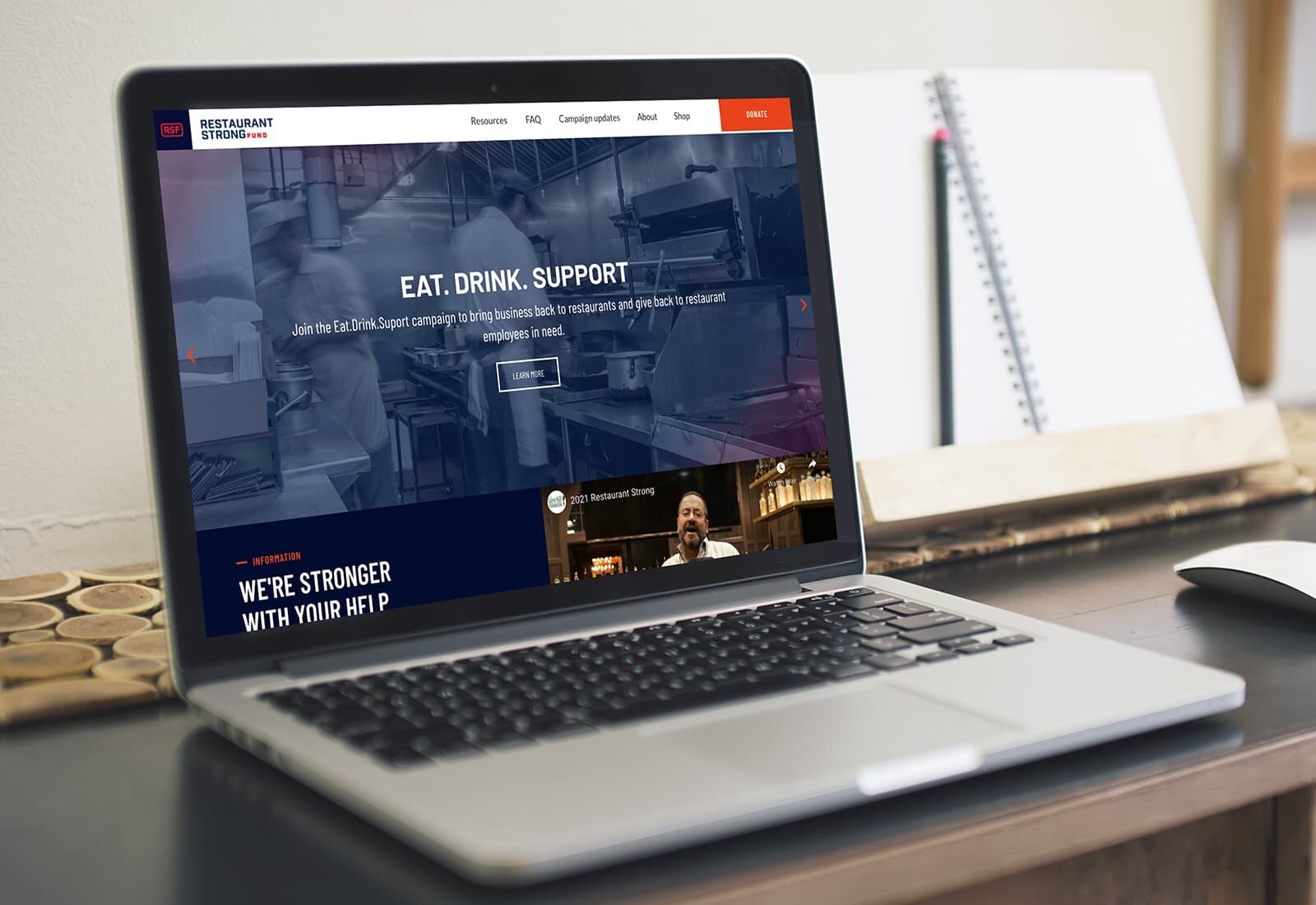 A laptop displaying the Restaurant Strong web site