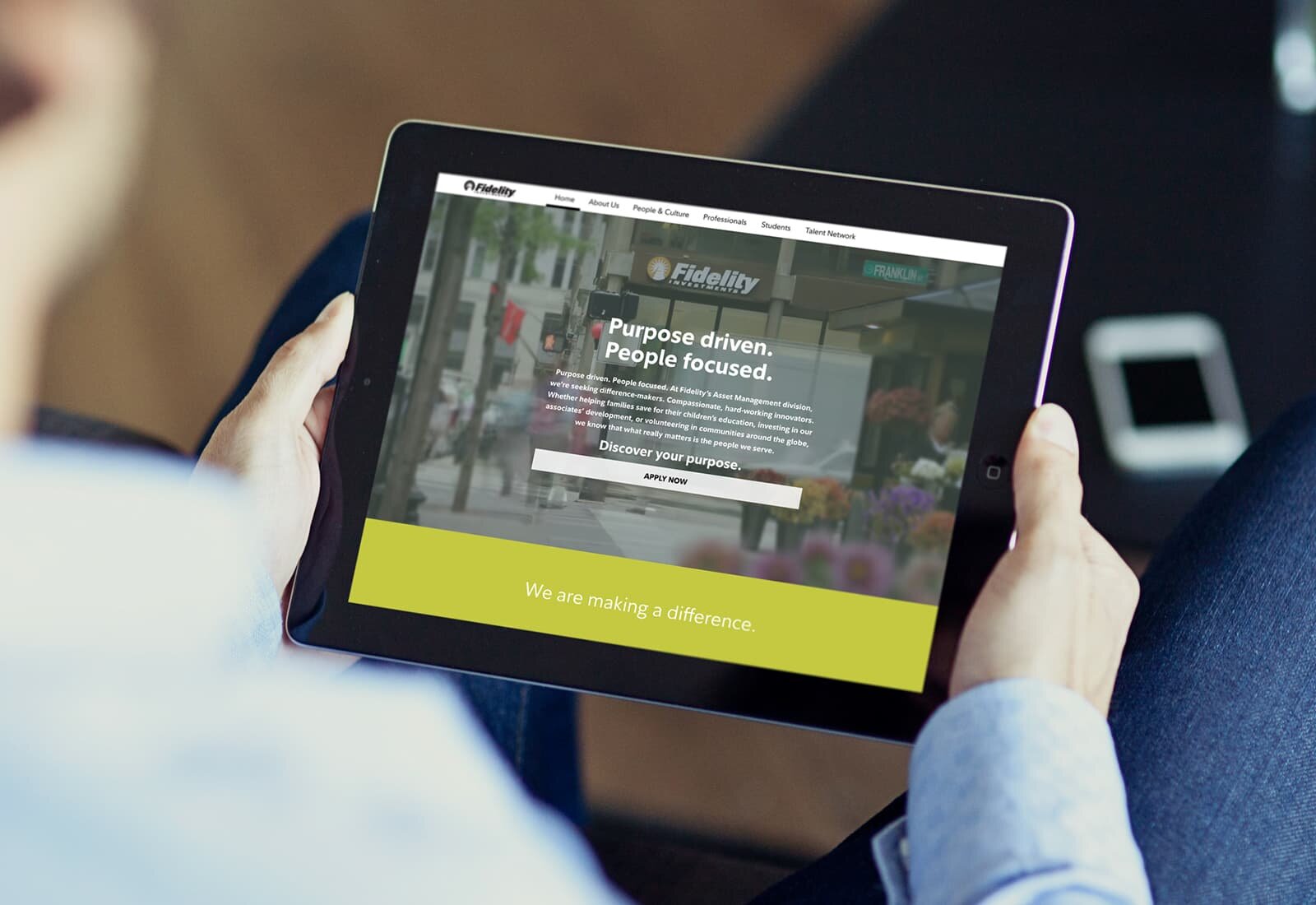 A tablet showing the Fidelity Asset Management Careers website