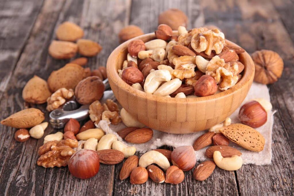 bowl of nuts - cashews, almonds, hazelnuts, walnuts