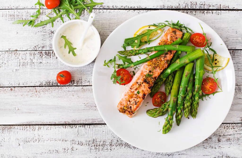 salmon and asparagus on a plate