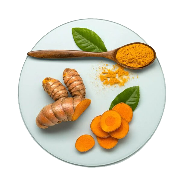  A flat-lay shot on a light blue-gray plate shows a combination of turmeric in different forms. A full root is shown next to a halved root, with a pile of sliced turmeric to the side, a wooden spoon with turmeric powder, and two green leaves.