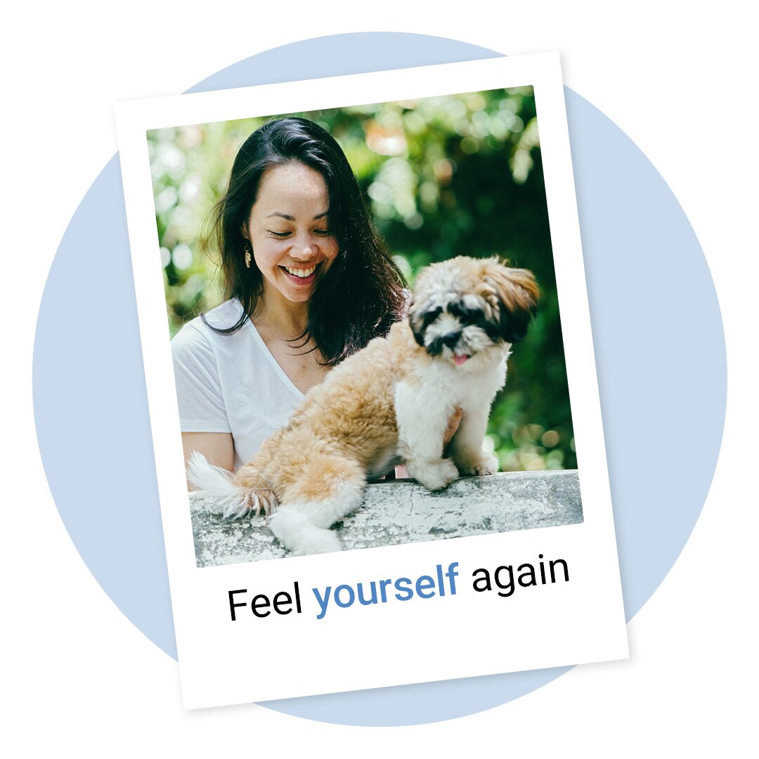 Happy woman with a small dog
