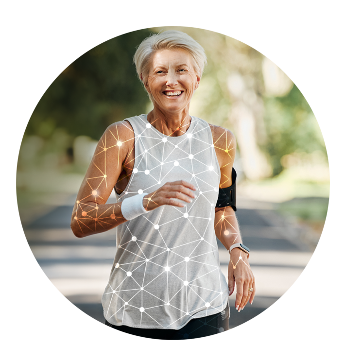  A mature woman with short white hair is shown running outside on a paved trail. A digital overlay of interconnected lines and dots glows on her body, representing a network.