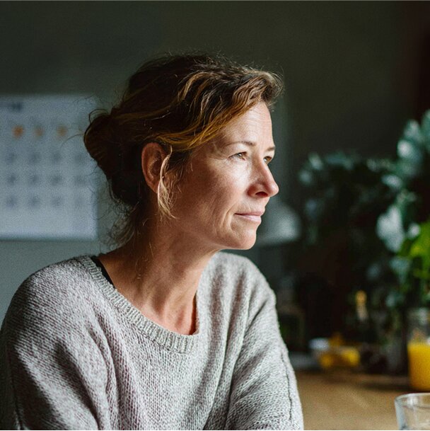 Woman looking out a window
