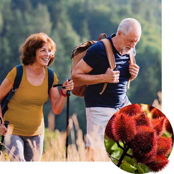  A mature couple smiles as they hike a trail, each with a backpack and one using hiking poles. An inset circular image shows a close-up of a cluster of red, spiky annatto seed pods.