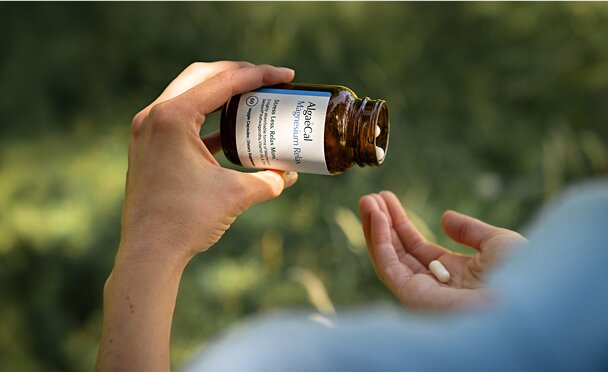 Dispensing pills from AlgaeCal Magnesium Relax™ Bottle