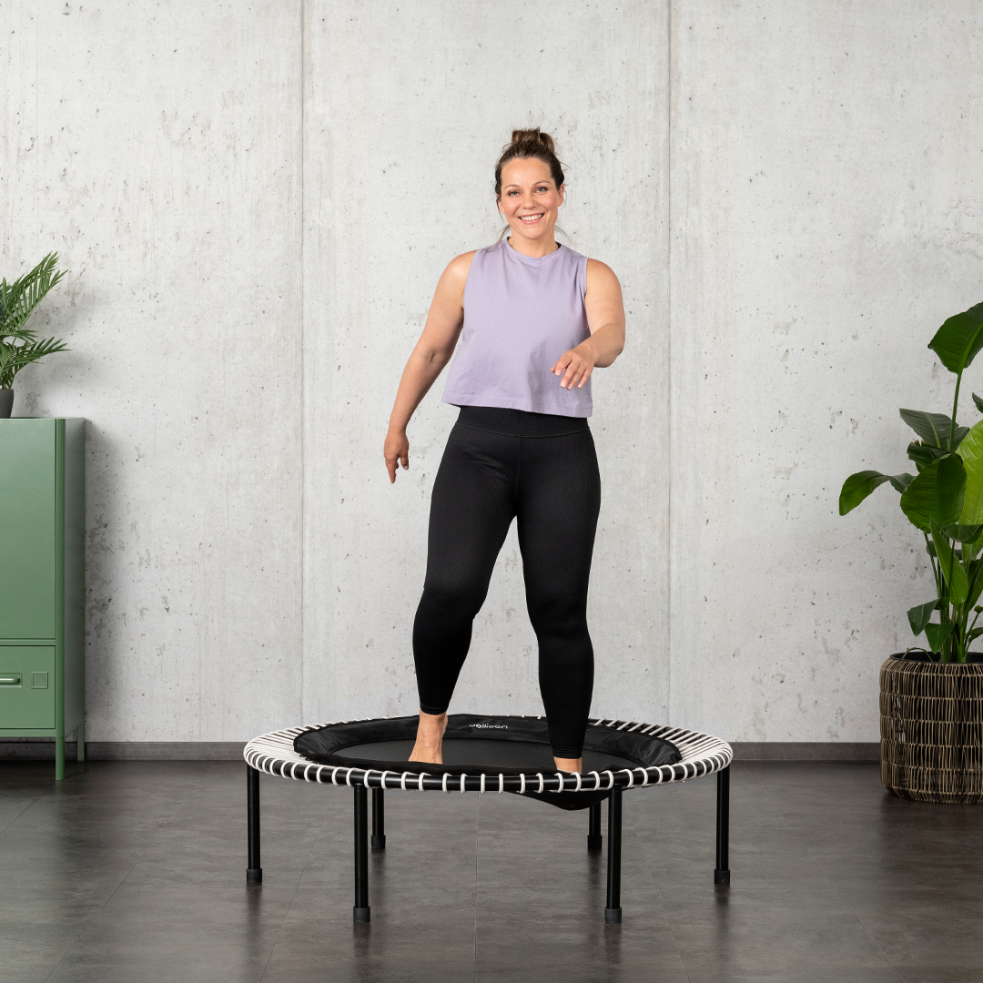 Woman on the bellicon is working low-impact.