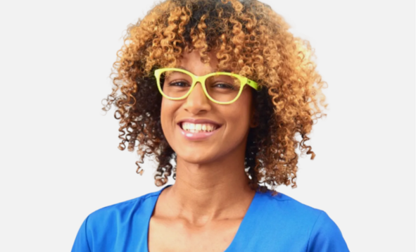 Happy customer wearing yellow eyeglasses