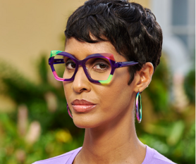 Person wearing classic style glasses with thin metal frames