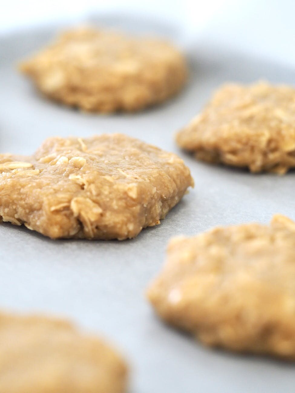 uncooked cookies on baking tray