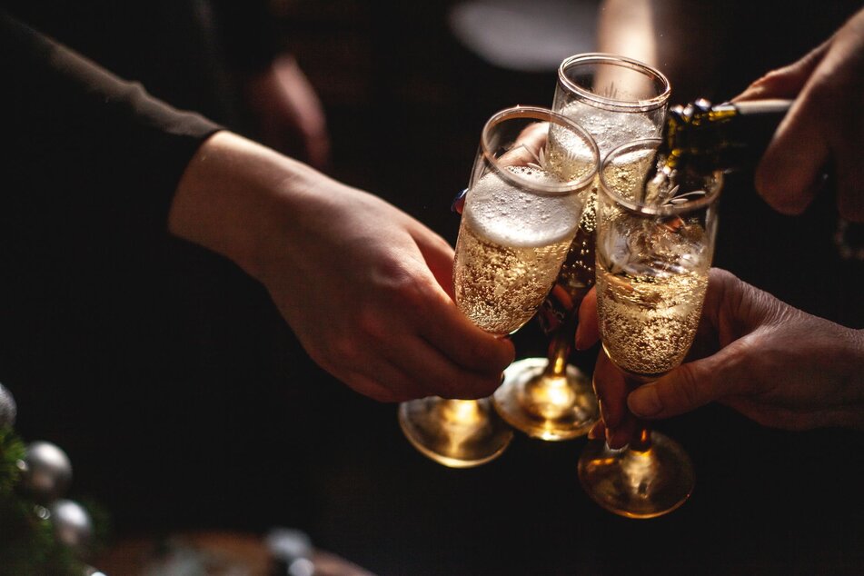 champagne glasses being filled