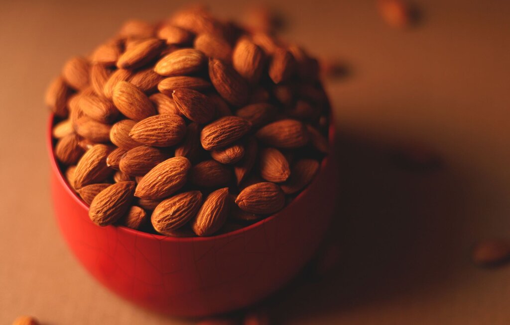 almonds in red bowl