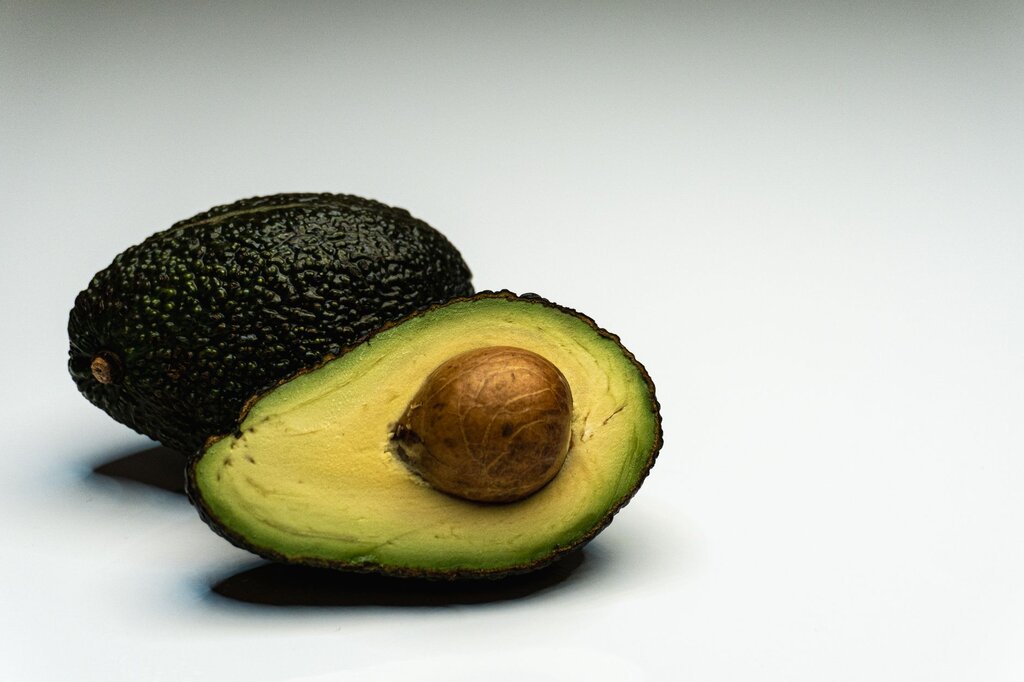 avocado halved showing pit