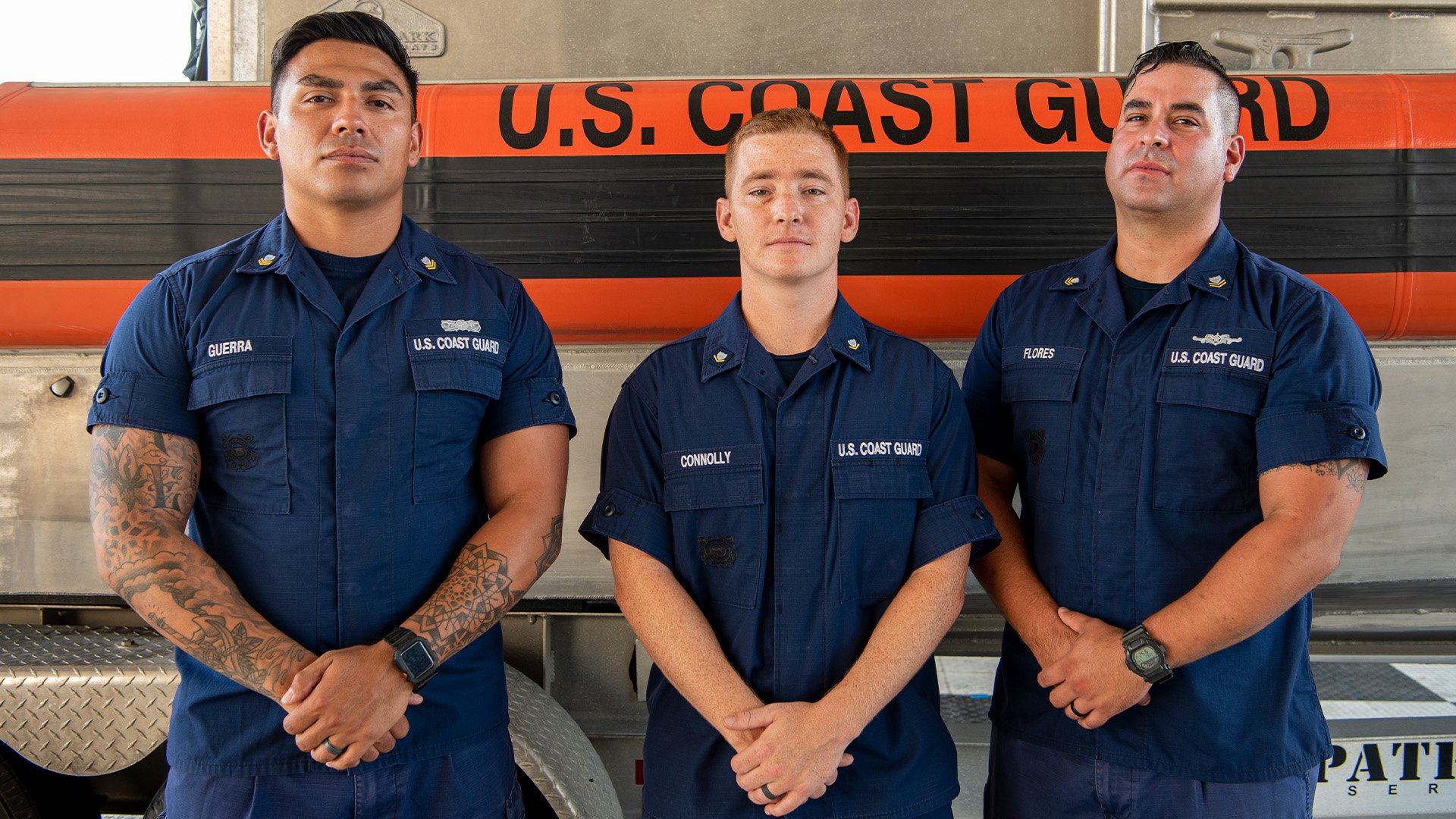 US Coast Guard Coast Guard Maritime Safety and Security Team Houston's Boatswain's Mate 2nd Class Jarrett Guerra, Boatswain's Mate 3rd Class Corey Connolly, and Maritime Enforcement Specialist 2nd Class Jake Flores are credited with saving a 1-year-old boy from drowning on the Rio Grande River in the toe of Texas on June 2, 2022. US Coast Guard photo by Public Affairs Specialist 1st Class Corinne Zilnicki.