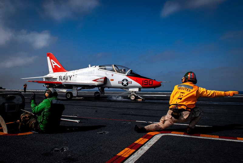 Yellow shirts aircraft carrier, aircrew colored shirts