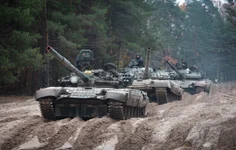 Ukrainian soldiers on captured Russian T-72 tanks hold military training close to the Ukraine-Belarus border near Chernihiv, Ukraine, Oct. 28, 2022. The West’s move to send tanks to Ukraine was greeted enthusiastically from Kyiv, Berlin, and Washington. But Moscow seemed to shrug. The Kremlin has warned the West that supplying tanks would be a dangerous escalation of the conflict and denounced the decision. AP photo by Aleksandr Shulman, File.