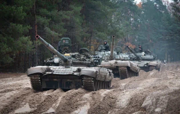FILE - Ukrainian soldiers on captured Russian tanks T-72 hold military training close to the Ukraine-Belarus border near Chernihiv, Ukraine, Friday, Oct. 28, 2022. The West's move to send tanks to Ukraine was greeted enthusiastically from Kyiv, Berlin and Washington. But Moscow seemed to shrug. The Kremlin has warned the West that supplying tanks would be a dangerous escalation of the conflict and denounced the decision. AP photo by Aleksandr Shulman, File.