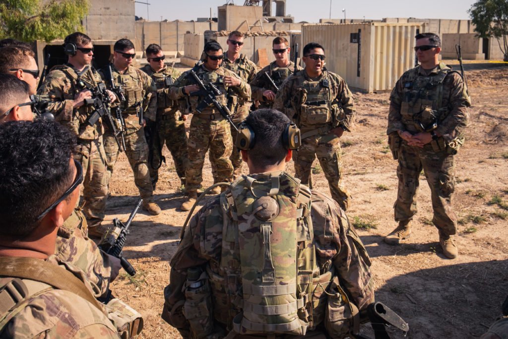 2nd Lt. Dude addresses his soldiers before they leave the wire.