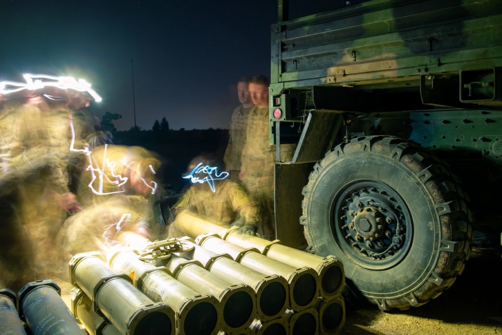  Soldiers conduct an inventory of ordnance prior to firing their M777 155 mm howitzer.