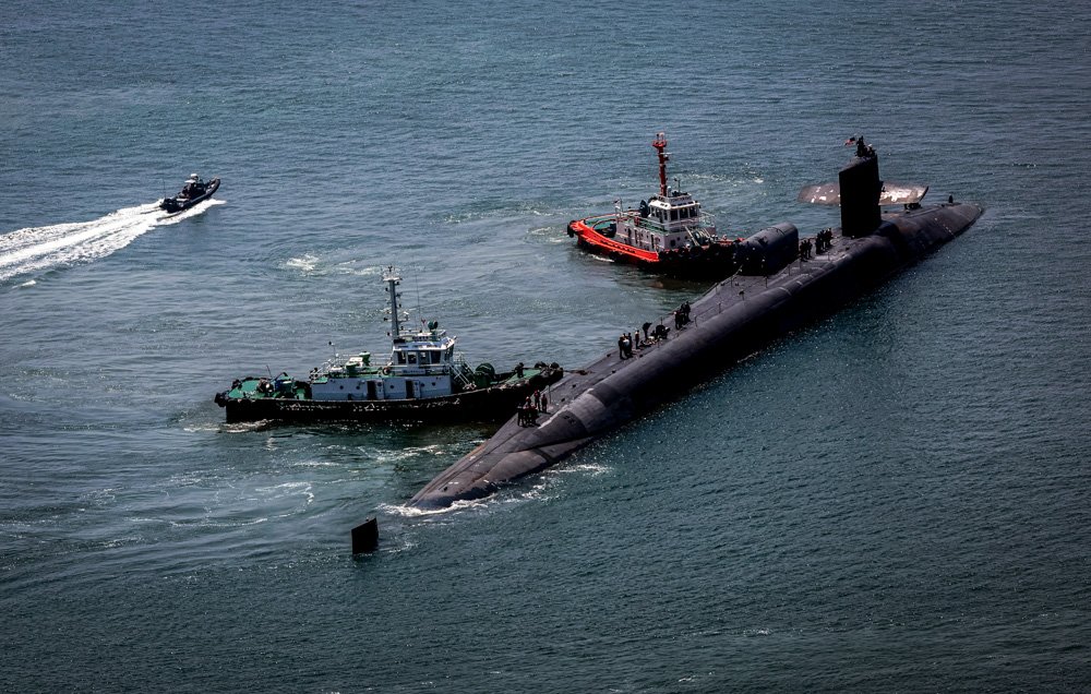 The nuclear-powered submarine USS Michigan approaches a naval base in Busan, South Korea.