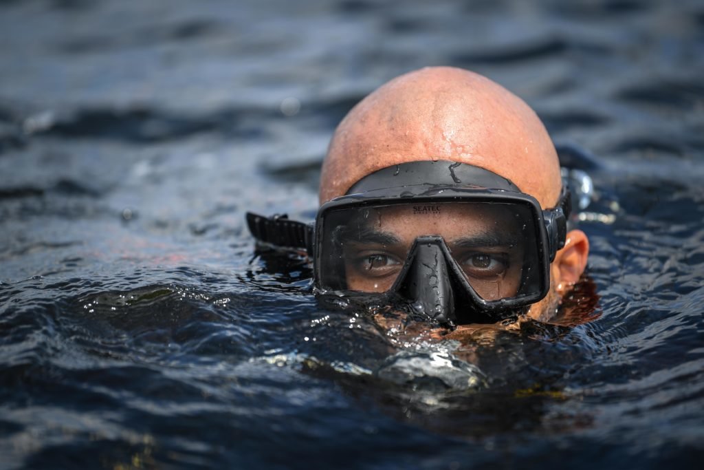 U.S. Navy SAEL Team Members conduct military dive operations during exercise TRIDENT 18-4 near Panama City Beach, Florida, July 18, 2018. Photo by Staff Sgt. Corban Lundborg/U.S. Air Force.