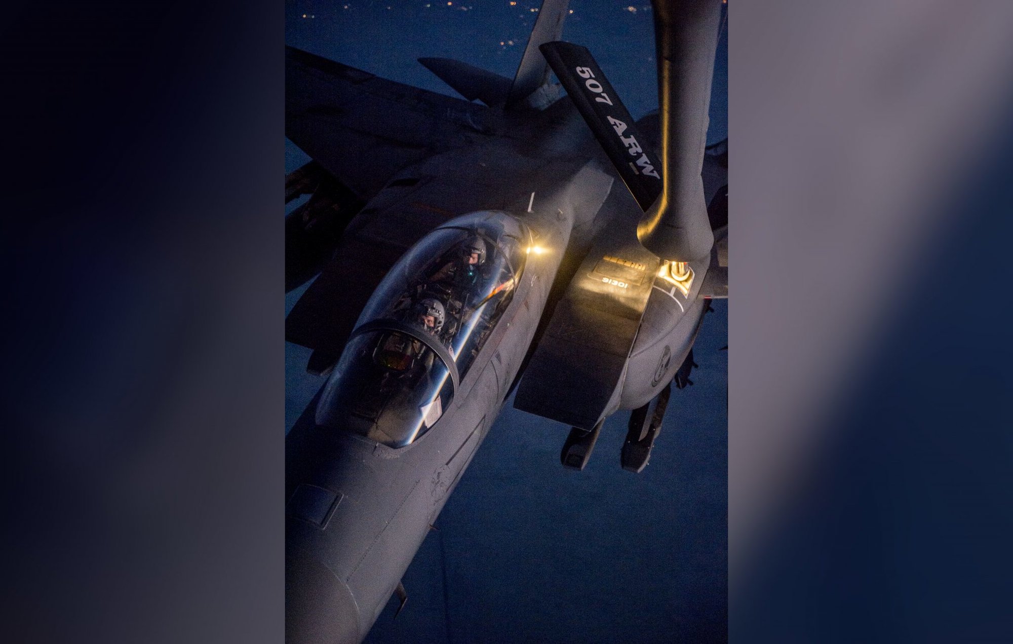 A U.S. Air Force F-15E Strike Eagle receives fuel from a KC-135 Stratotanker over northern Iraq after conducting airstrikes in Syria, Sept. 23, 2014. These aircraft were part of a large coalition strike package that was the first to strike ISIL targets in Syria. (U.S. Air Force photo by Senior Airman Matthew Bruch/Released)