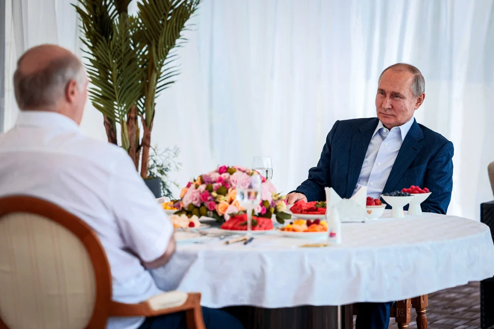 Russian President Vladimir Putin speaks during his meeting with Belarusian President Alexander Lukashenko at the Bocharov Ruchei residence in the resort city of Sochi, Russia,