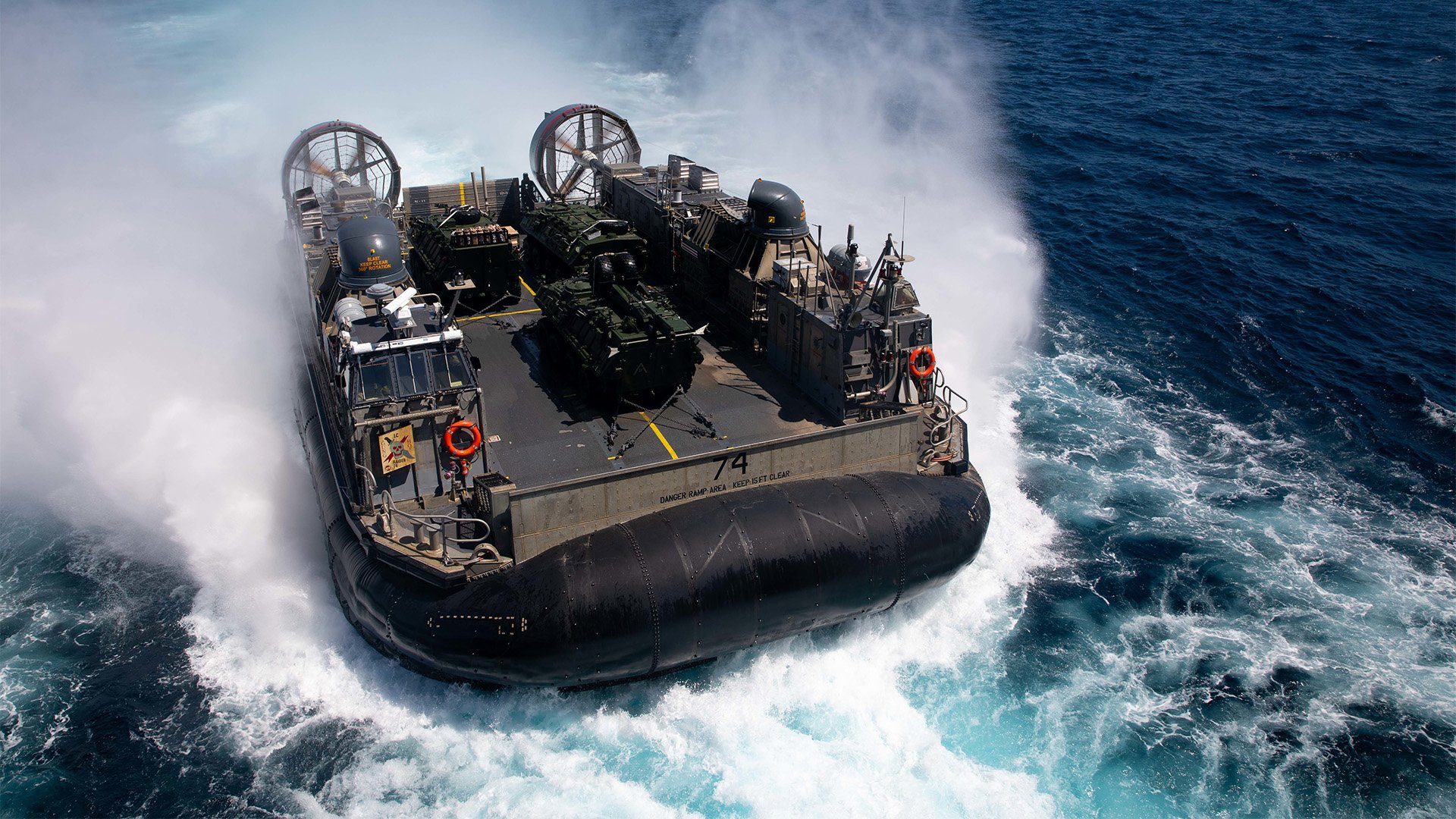 A landing craft, air cushion (LCAC) from Assault Craft Unit 5 approaches the well deck of amphibious assault ship Makin Island on Aug. 1, 2022. A petty officer assigned to ACU-5, Machinery Repairman 3rd Class Gasper Moreno Jr., has failed to overturn his conviction for sexually assaulting a Navy shipmate. US Navy photo by Mass Communication Seaman Apprentice Joshua Martinez.