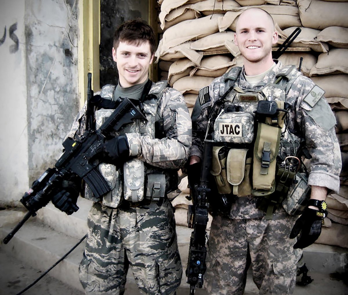 Senior Airmen Mike Malarsie and Bradley Smith pose for a photo during their Afghanistan deployment. An improvised explosive device attack mortally wounded Airman Smith and injured Airman Malarsie Jan. 3, in Afghanistan. The two tactical airlift control party Airmen were assigned to the 10th Air Support Operations Squadron at Fort Riley, Kan. (Courtesy photo)