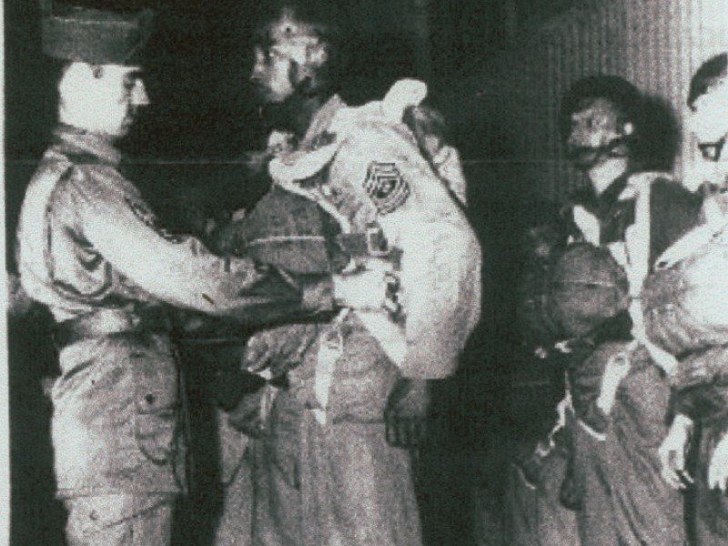 Then-1st. Sgt. Walter Morris, right, prepares for his first jump with the 555th Parachute Infantry Regiment. Photo by Maj. Thomas Cieslak/3rd Brigade Combat Team, 82nd Airborne Division, courtesy of the U.S. Army.