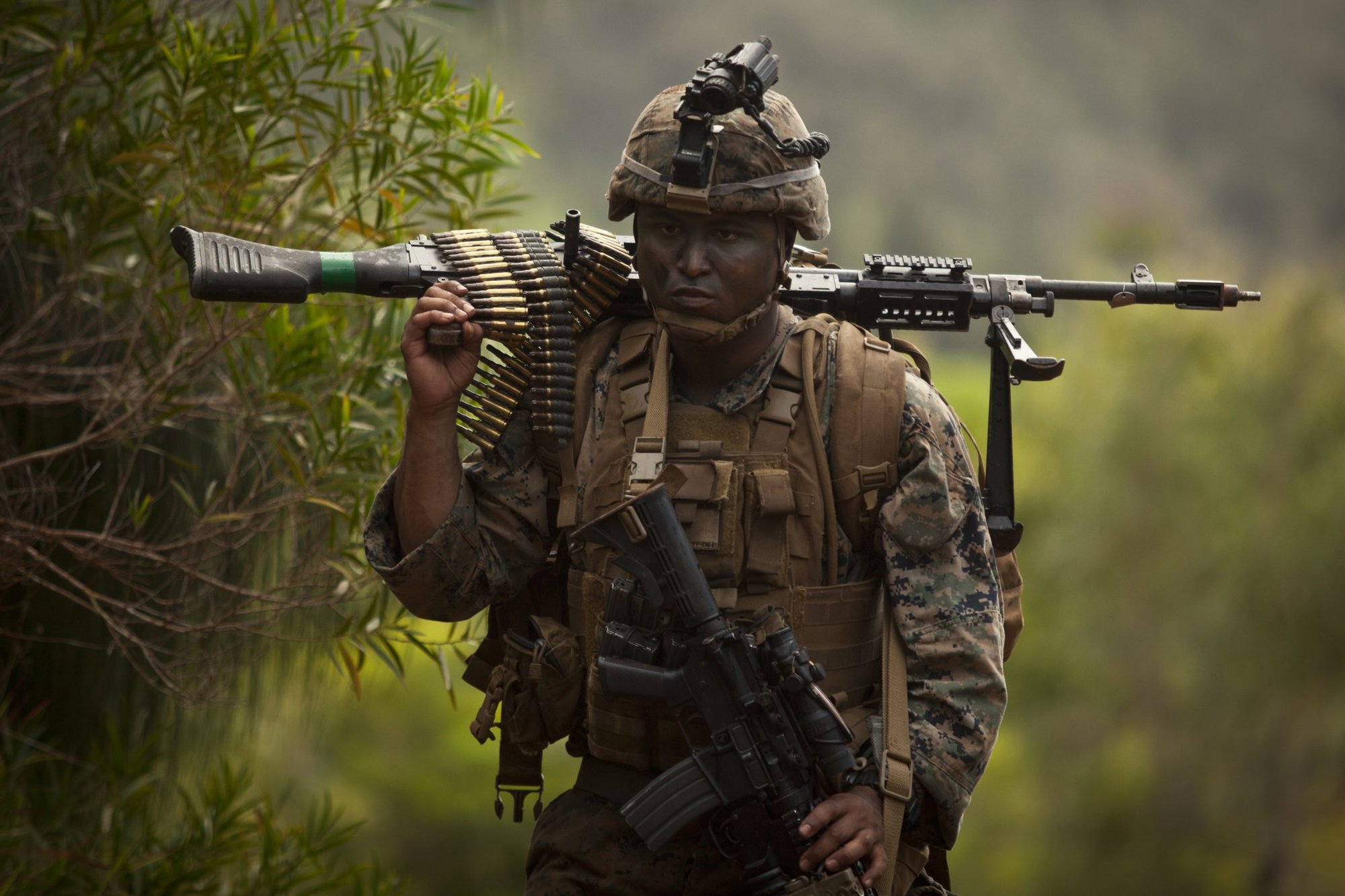 U.S. Marine Corps Lance Cpl. Jonathan Peguero, a team leader assigned to Fox Company, 2nd Battalion, 3rd Marine Regiment, carries M240G Medium Machine Gun during the Advanced Infantry Course (AIC) aboard Kahuku Training Area, Hawaii, July 18, 2016. AIC is intermediate training designed to enhance and test the Marine’s skills and leadership abilities as squad leaders in a rifle platoon. (U.S. Marine Corps Photo by Cpl. Aaron S. Patterson/Released)