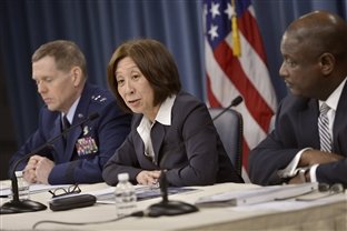 Teri Takai, center, the Defense Department's chief information officer, Air Force Maj. Gen. Robert E. Wheeler, left, the department's deputy chief information officer, and Frederick J. Moorefield Jr., right, the department's director of spectrum policy and programs, brief reporters on the department's release of its electromagnetic spectrum strategy. Photo courtesy of the DOD.