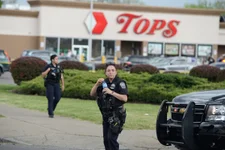 Buffalo Police officers at a Tops Friendly Market on May 14, 2022. in Buffalo, New York. A gunman shot and killed 10 people, mostly black shoppers. Photo by John Normile/Getty Images.