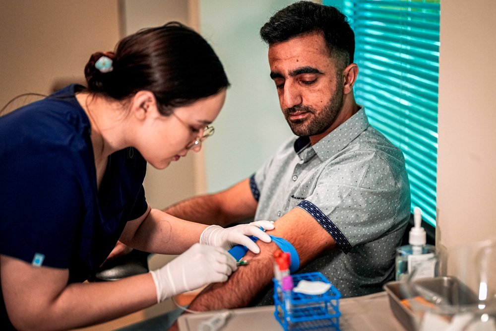 Abdul Wasi Safi waits in the dentist's chair during a clinic visit.