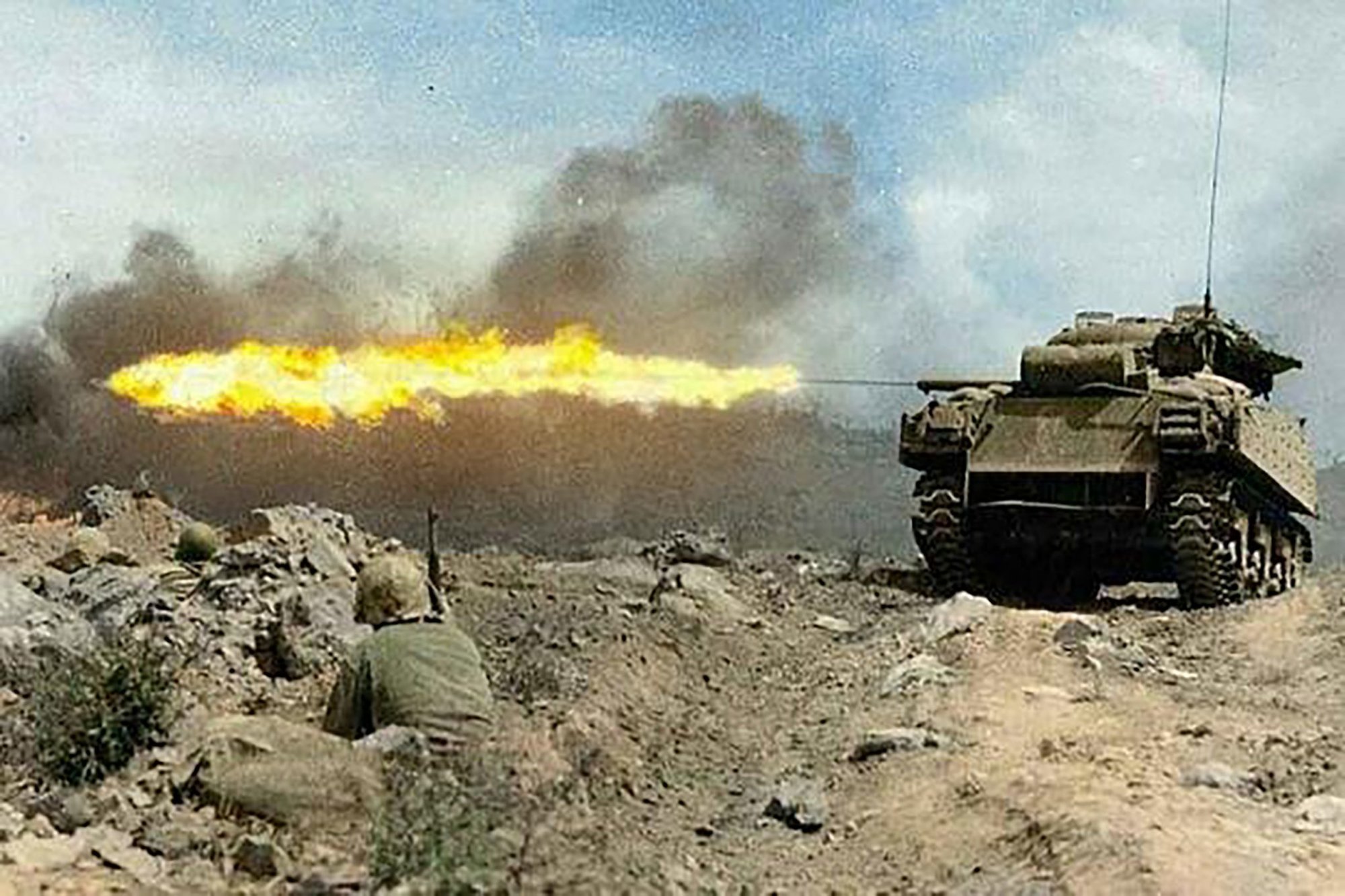 A Marine flame throwing tank, also known as a “Ronson”, scorches a Japanese strongpoint. The eight M4A3 Shermans equipped with the Navy Mark 1 flame-thrower proved to be the most valuable weapons systems on Iwo Jima. (Department of Defense/Mark Kauffman)
