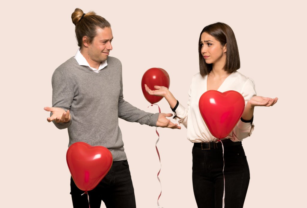 Couple in valentine day unhappy and frustrated with something because not understand something