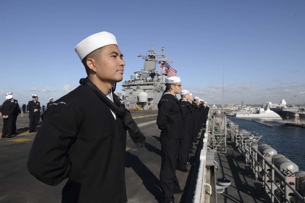 Sailors man the rails of the amphibious assault ship USS Boxer (LHD 4) on Nov. 27, 2019. Boxer, part of the Boxer Amphibious Ready Group (ARG), is returning to its homeport of San Diego following a 7-month deployment to the 5th and 7th fleet area of operations. Photo by Mass Communication Specialist Seaman Apprentice Logan A. Southerland, courtesy of the U.S. Navy.