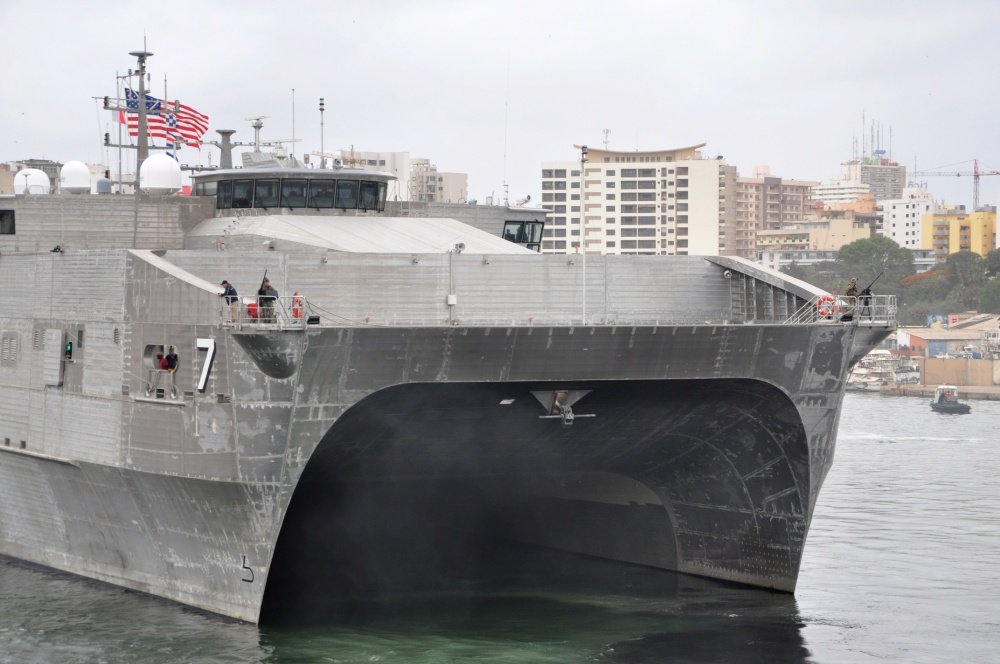 The Spearhead-class expeditionary fast transport ship USNS Carson City arrives in Dakar, Senegal, for the first port visit of its Africa Partnership Station Gulf of Guinea deployment, July 6, 2019. US Navy photo courtesy of Chief Yeoman Yonet Garcia/DVIDS.