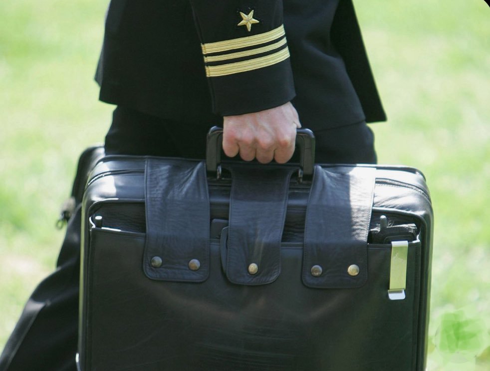 Colloquially known as so-called nuclear football, the the Presidential Emergency Satchel contains the documents, codes, and communications equipment needed to authorize a nuclear strike in minutes. Photo via @Johnwritlarge on Twitter.